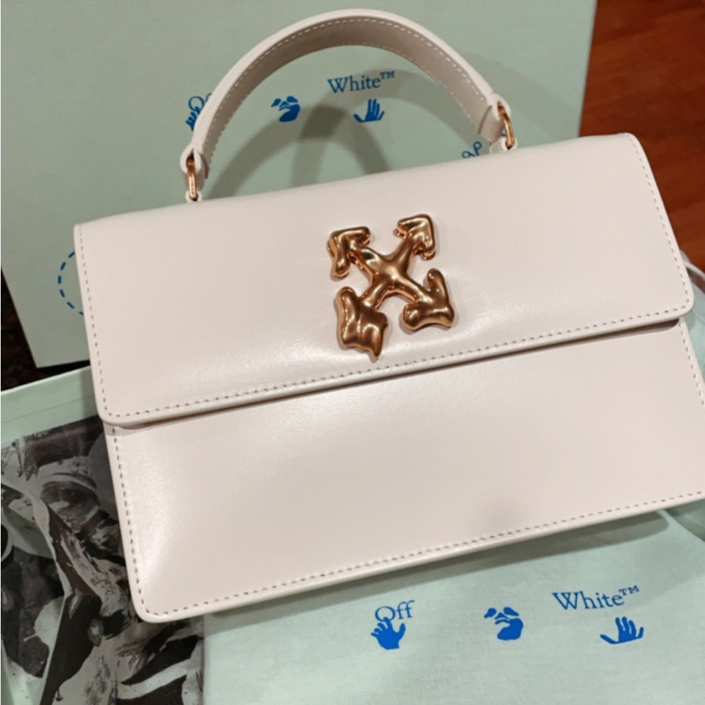 Off-White
Jitney 1.4 Leather Top Handle Bag